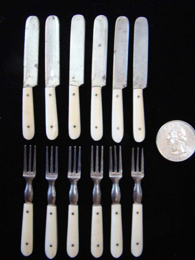 A charming set of 19th century bone handled 'Doll House' cutlery